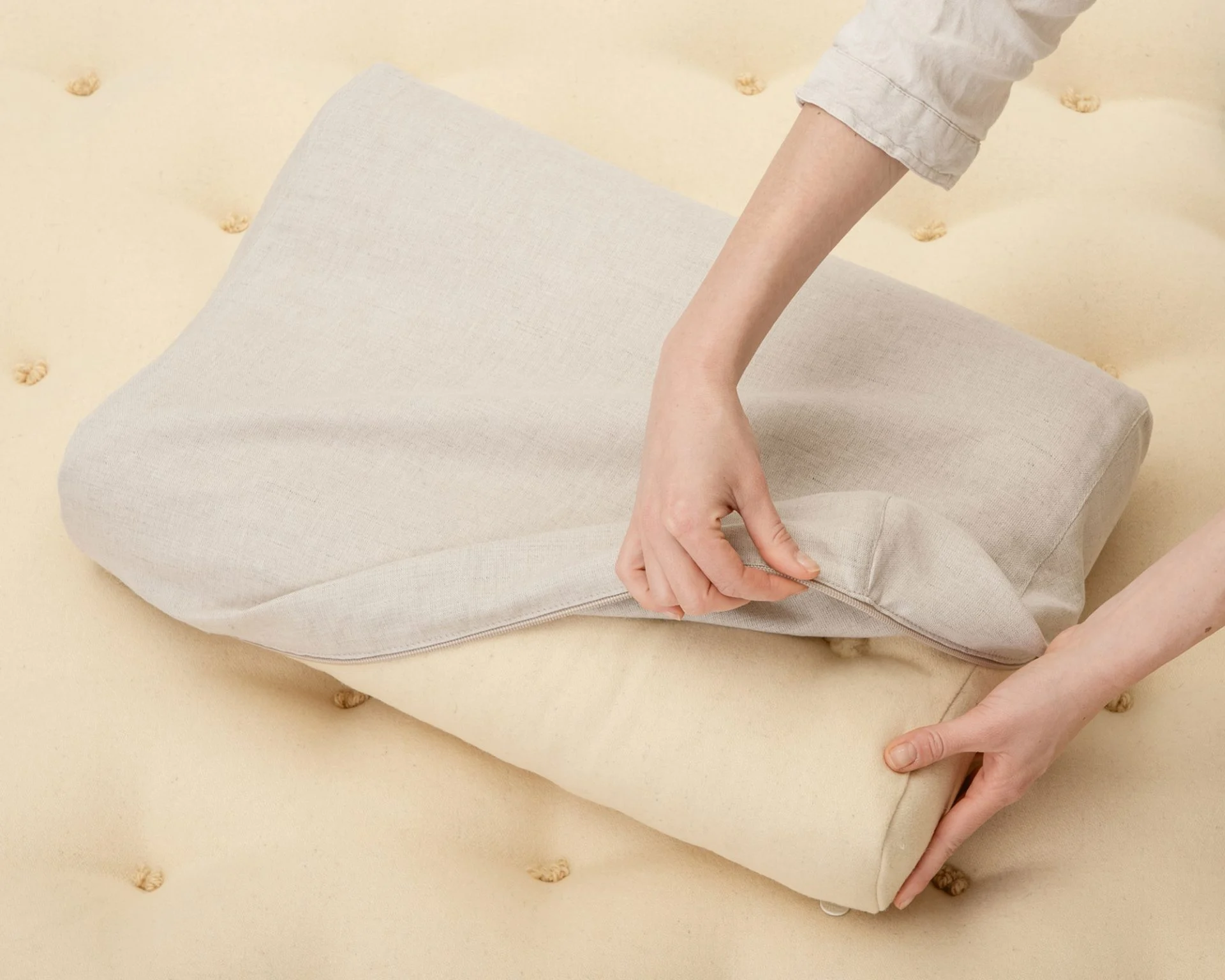 Ergonomic bedroom pillows on a bed